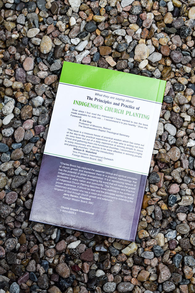 Back of indigenous church planting book with pebbles in the background